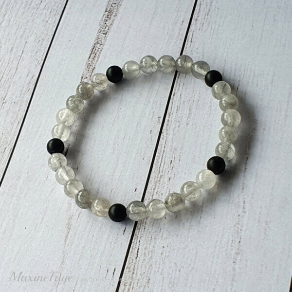 Matte Black Onyx and Cloudy Quartz stretch bracelet suitable for people with metal allergies