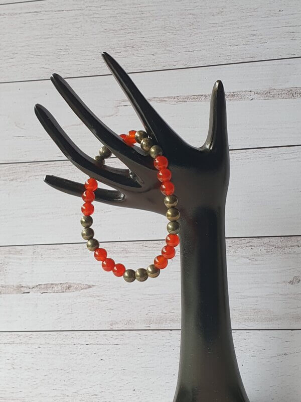 This orange-red Carnelian and gold Pyrite stone stretch bracelet may be suitable for people who have a metal allergy.