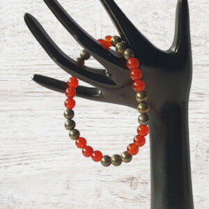 This orange-red Carnelian and gold Pyrite stone stretch bracelet may be suitable for people who have a metal allergy.