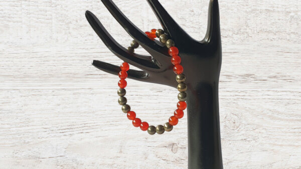 This orange-red Carnelian and gold Pyrite stone stretch bracelet may be suitable for people who have a metal allergy.