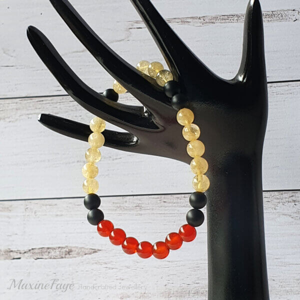 This Matte Black Onyx, Carnelian & Citrine gemstone stretch bracelet is suitable for people who have a metal allergy.