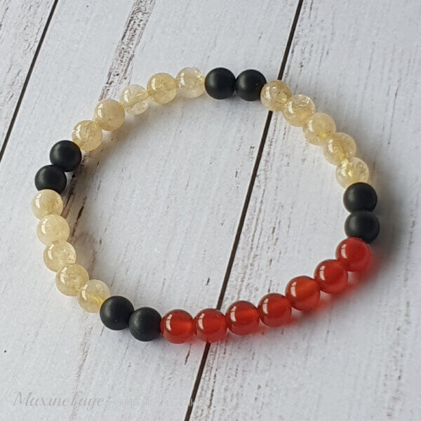 This Matte Black Onyx, Carnelian & Citrine gemstone stretch bracelet is suitable for people who have a metal allergy.