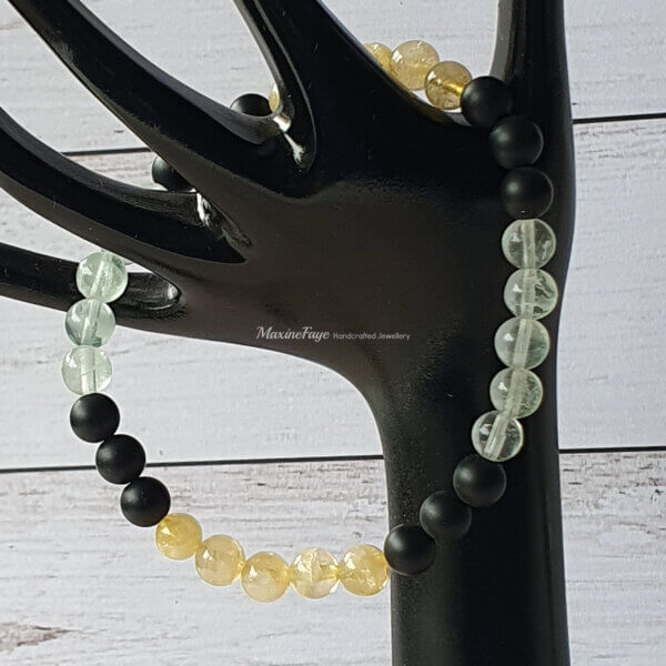 This Fluorite, Citrine and Onyx gemstone stretch bracelet is suitable for people who have a metal allergy.