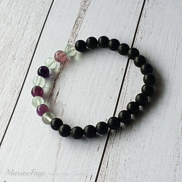 This Black Onyx and Rainbow Fluorite gemstone stretch bracelet is suitable for people who have a metal allergy.