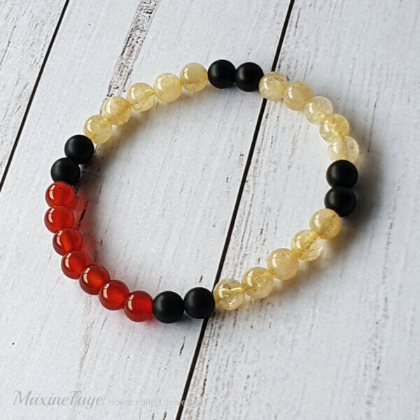 This Matte Black Onyx, Carnelian & Citrine gemstone stretch bracelet is suitable for people who have a metal allergy.