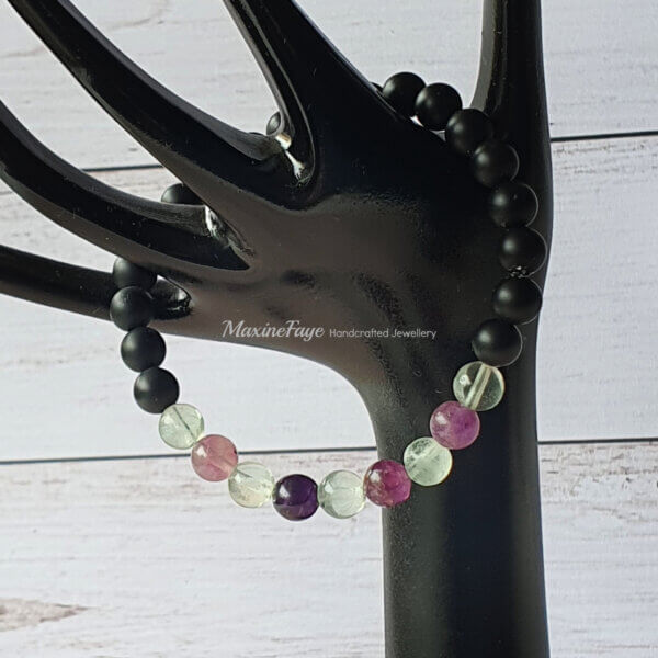 This Black Onyx and Rainbow Fluorite gemstone stretch bracelet is suitable for people who have a metal allergy.